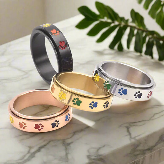 Spinning Stress Reducing Paw Ring – Stainless Steel with Rainbow Paws