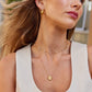 Elegant Golden Pearl Necklace by Reine
