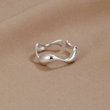 Elegant Silver Wave Band