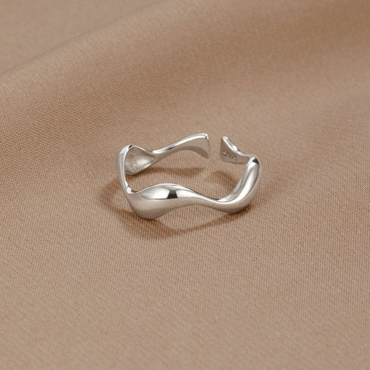 Elegant Silver Wave Band