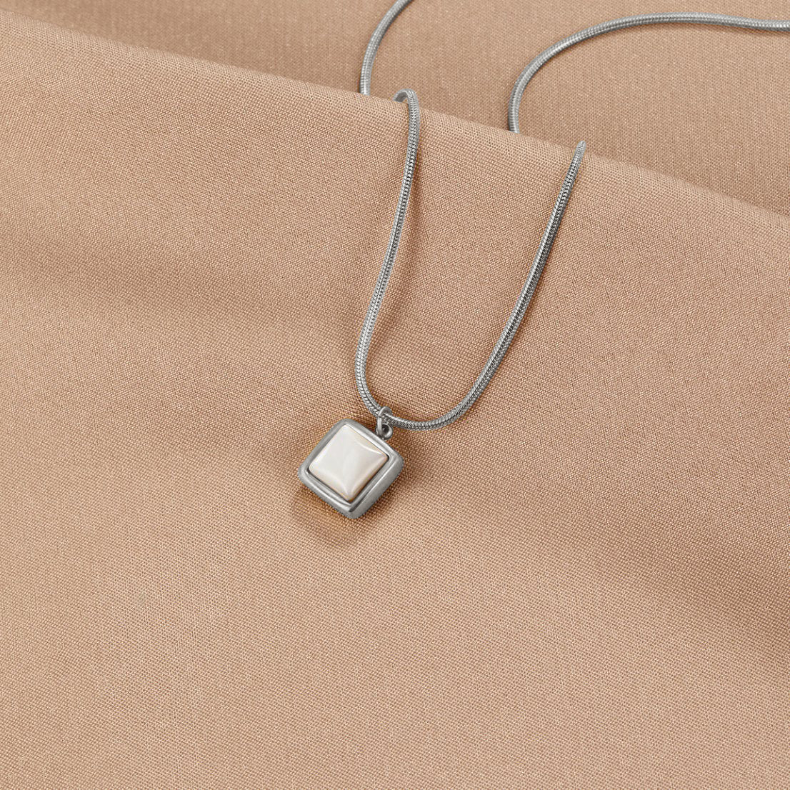 Riva Mondstein Pendant Necklace" Reimagined Title: "Riva Moonstone Pendant Necklace